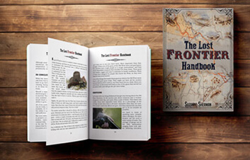 The Lost Frontier Handbook wide opened on the left side and the book cover on the right side